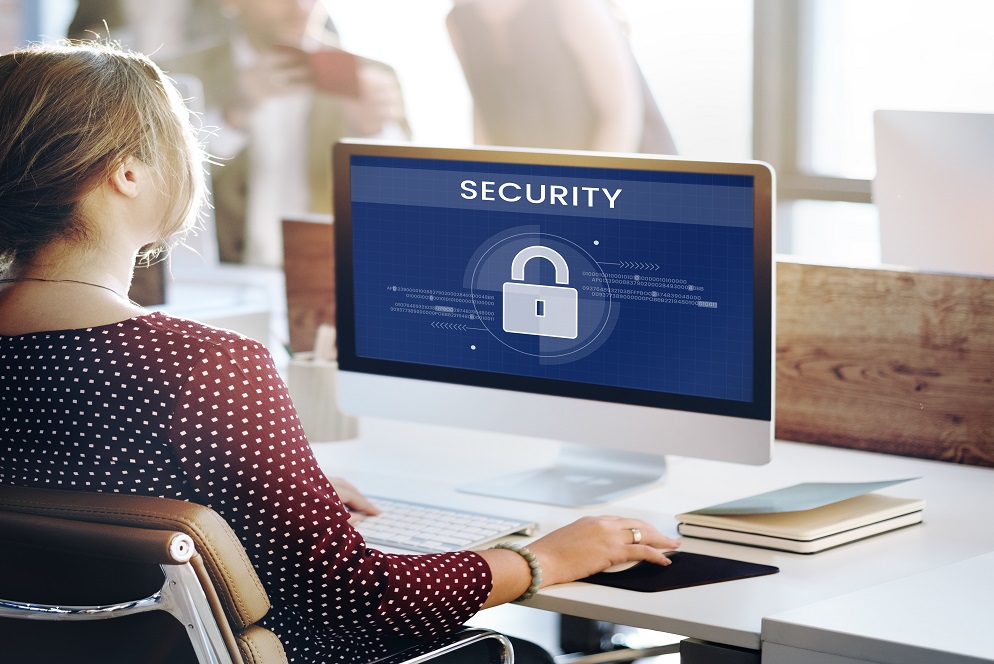 Woman working on computer Cyber Securty overlay